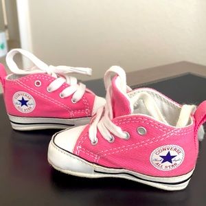 Pink baby chuck taylors